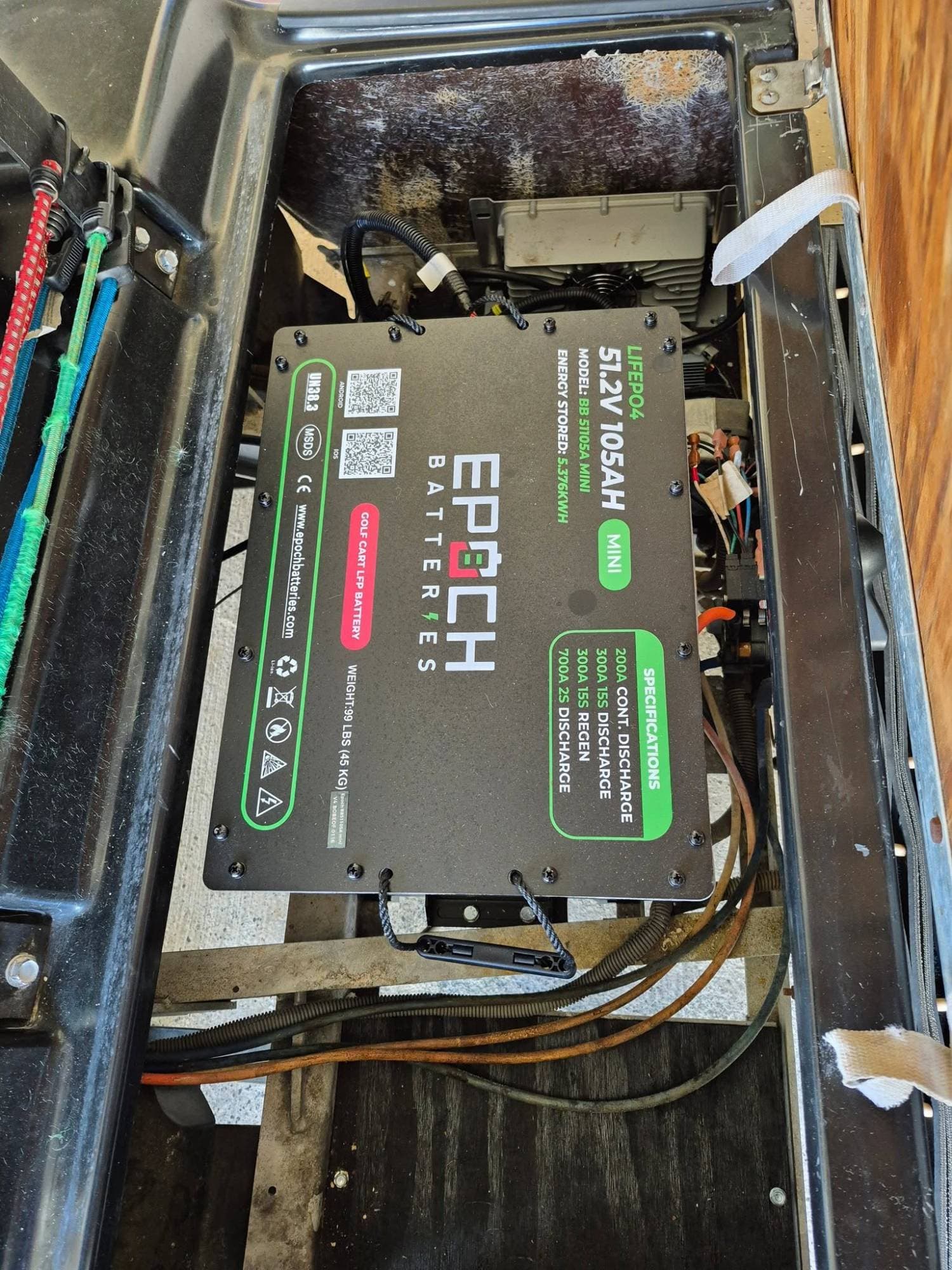 Epoch Big Box 48V 105Ah Mini LiFePO4 golf cart battery installed under the seat of a golf cart